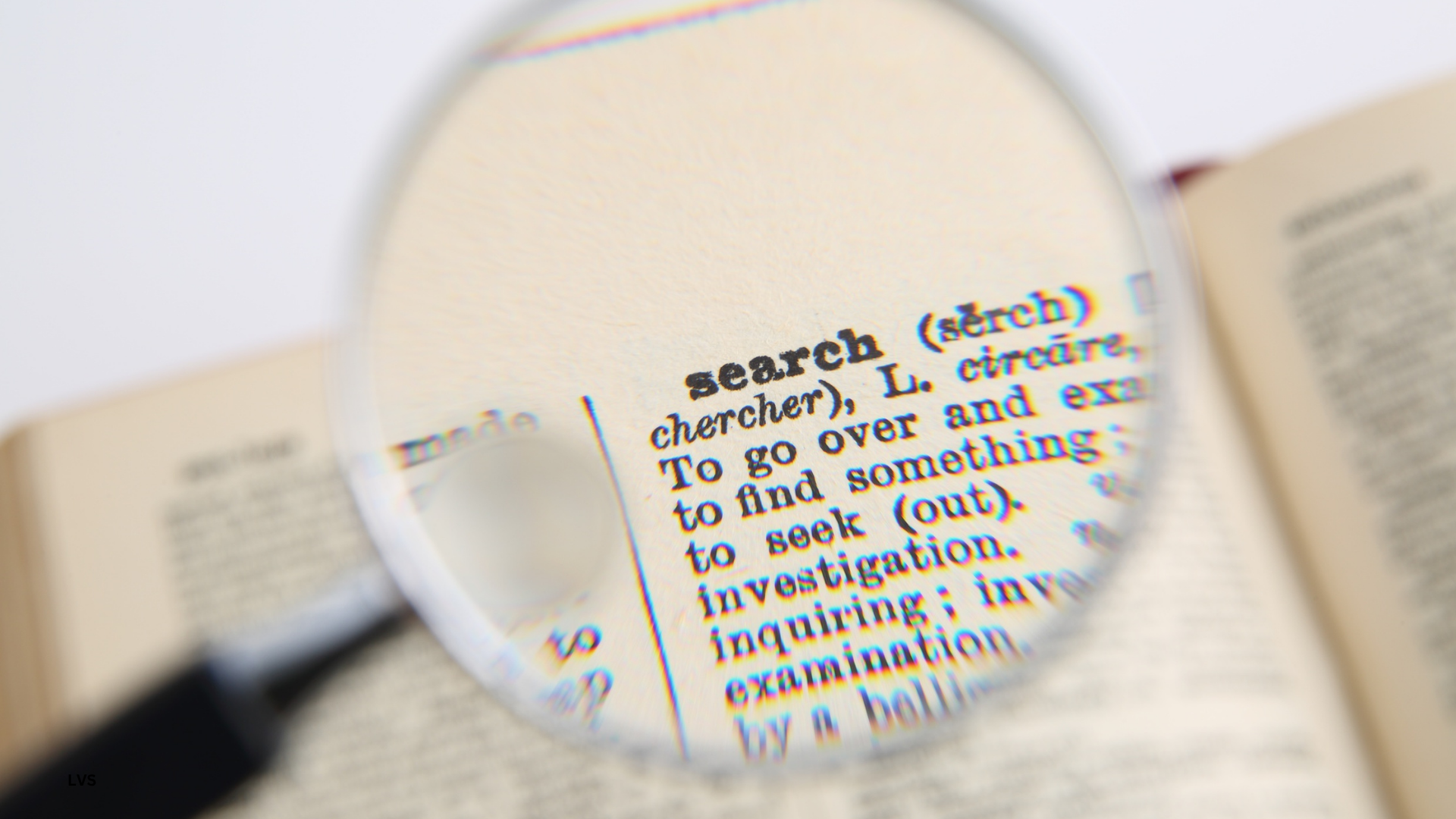 Magnifying glass making text appear larger.