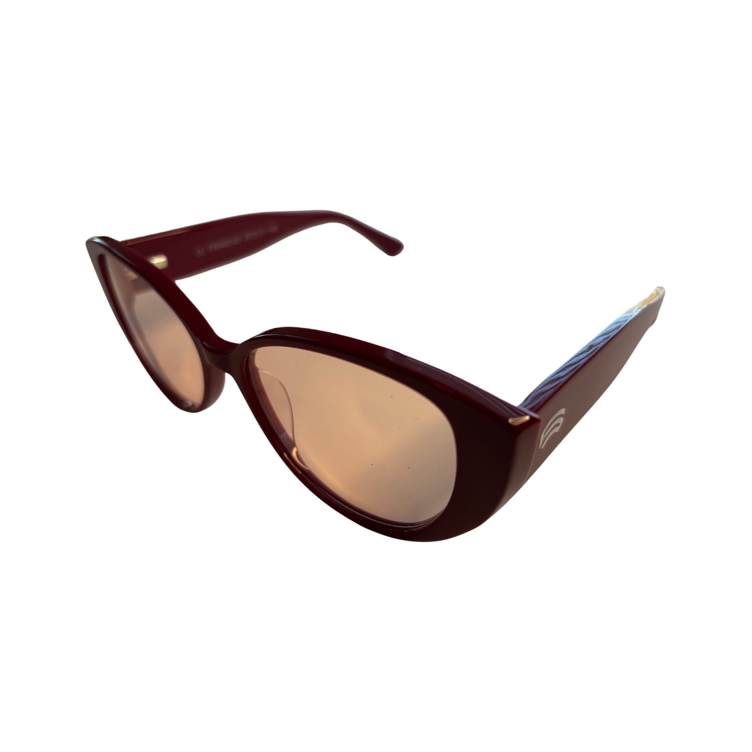 Left side of red Schweizer FR4 migraine glasses with light rose tint.