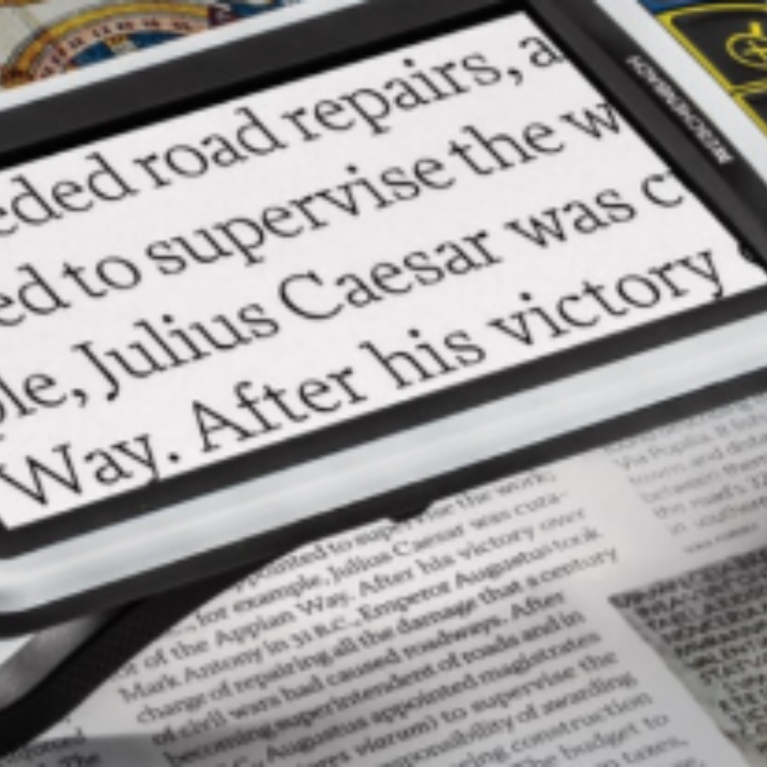 Close-up of a video magnifier displaying enlarged text from a document.