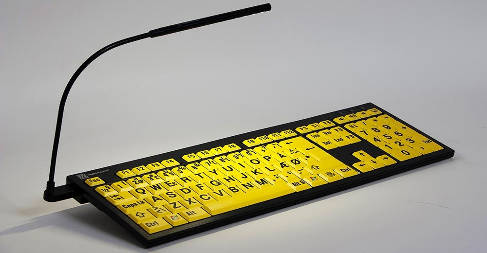 Image of the Nero LargePrint Slimline Black on Yellow PC Keyboard from LogicKeyboard lwith included light.