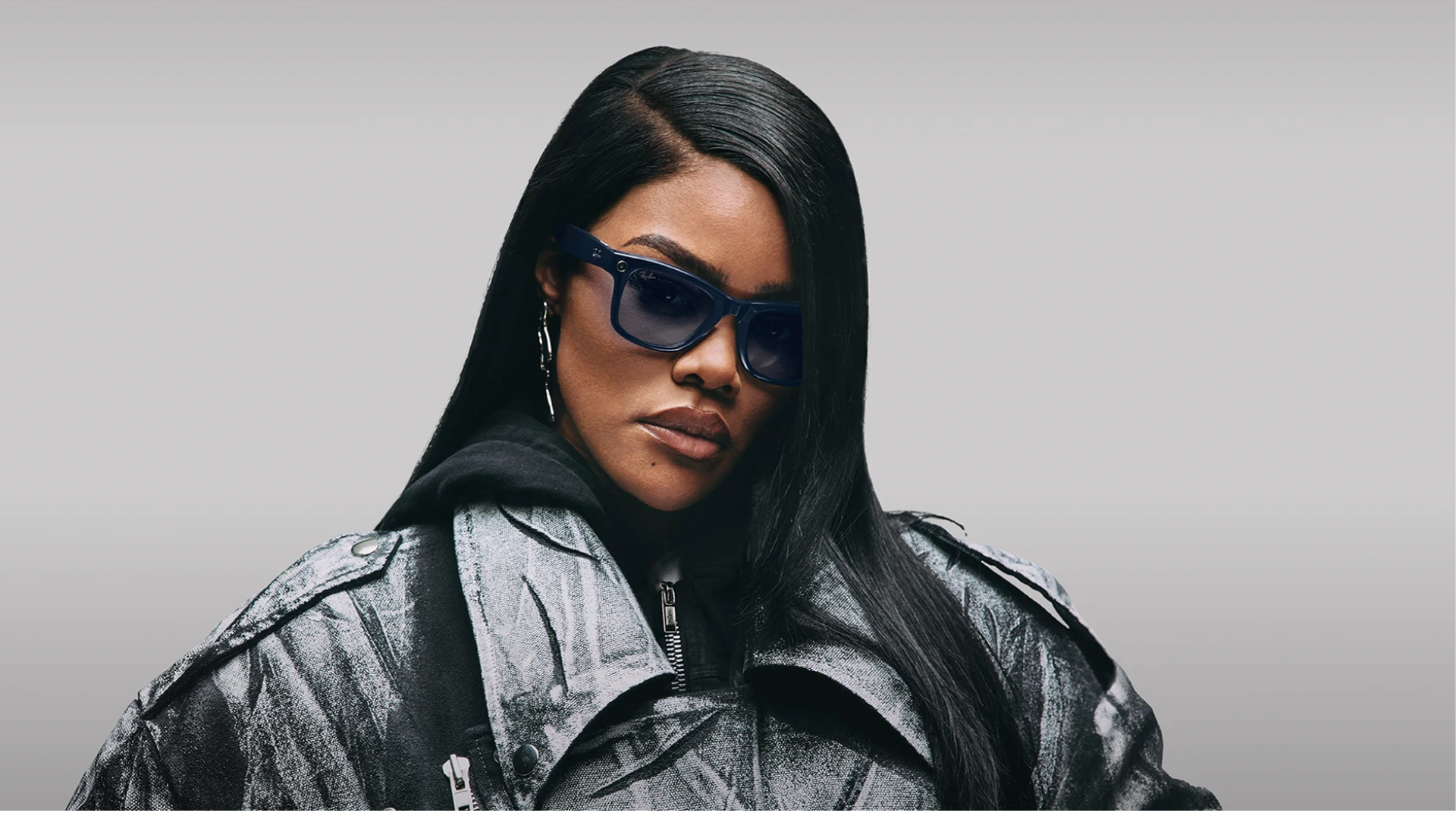 Woman wearing Ray-Ban Meta smart glasses.