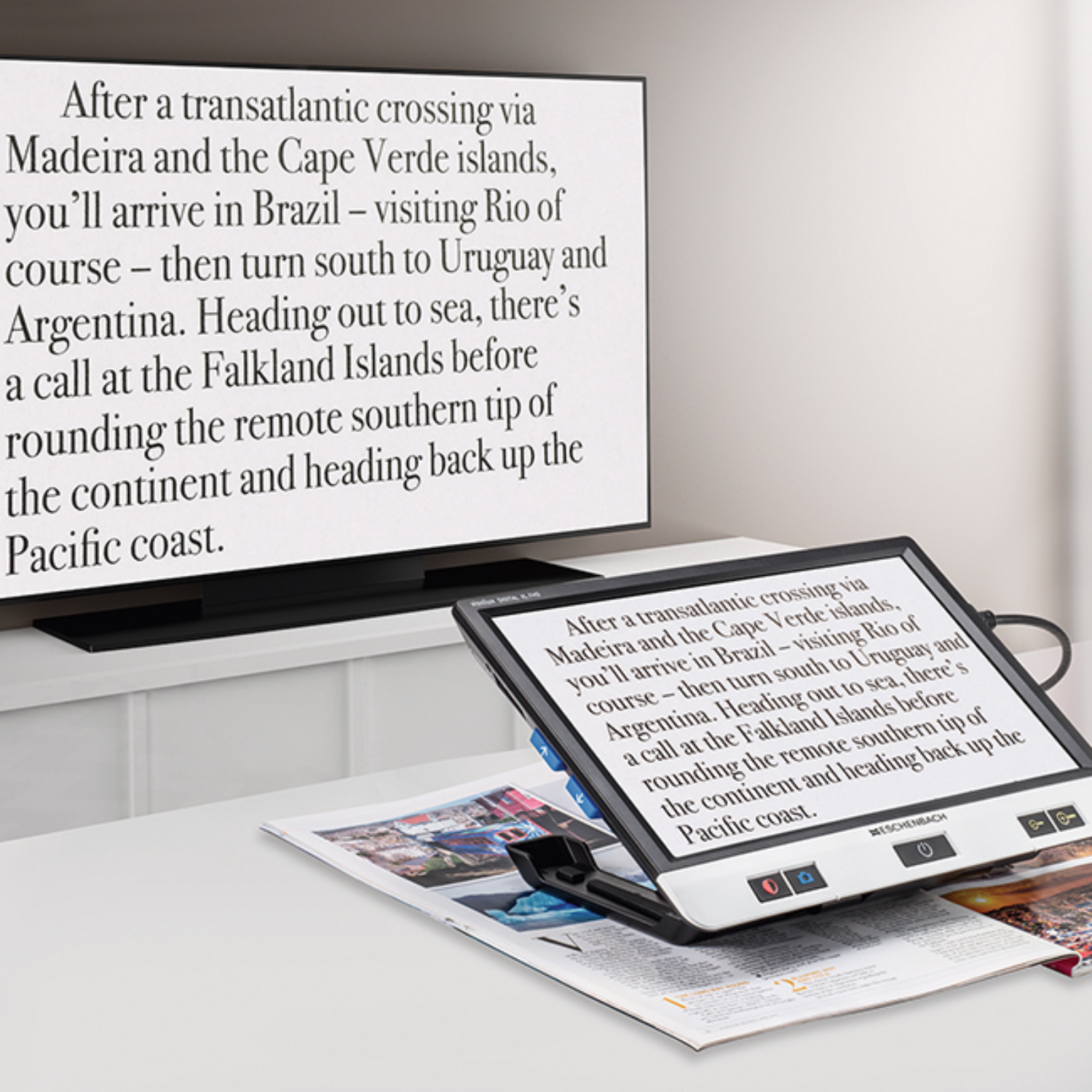 Image of the Visolux Digital XL FHD 12" portable video magnifier showing it magnifying text on a table
