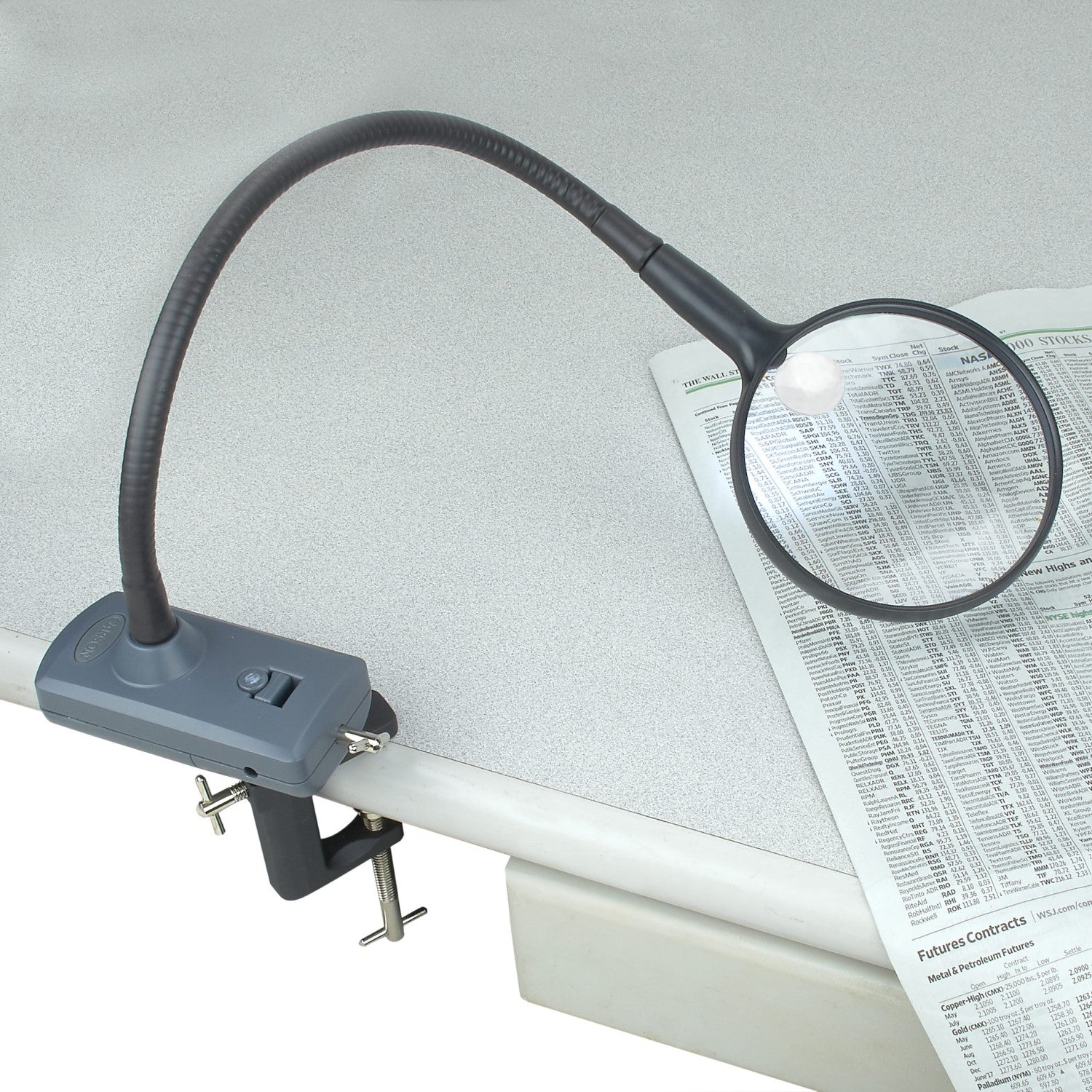 Image of  Magniflex magnifier in use, clamped to a table.